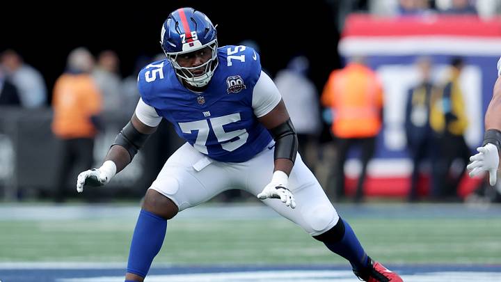 Dec 8, 2024; East Rutherford, New Jersey, USA; New York Giants guard Joshua Ezeudu (75) during the first quarter against the New Orleans Saints at MetLife Stadium. Mandatory Credit: Brad Penner-Imagn Images