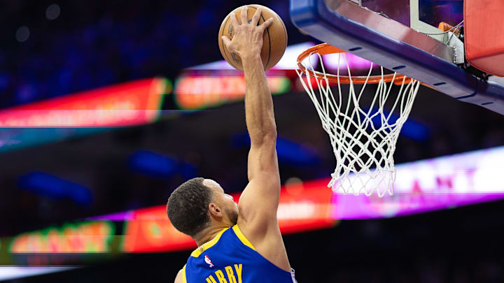 Mar 1, 2025; Philadelphia, Pennsylvania, USA; Golden State Warriors guard Stephen Curry (30) dunks the ball against the Philadelphia 76ers during the fourth quarter at Wells Fargo Center. Mandatory Credit: Bill Streicher-Imagn Images Mar 1, 2025; Philadelphia, Pennsylvania, USA; Golden State Warriors guard Stephen Curry (30) dunks the ball against the Philadelphia 76ers during the fourth quarter at Wells Fargo Center. Mandatory Credit: Bill Streicher-Imagn Images