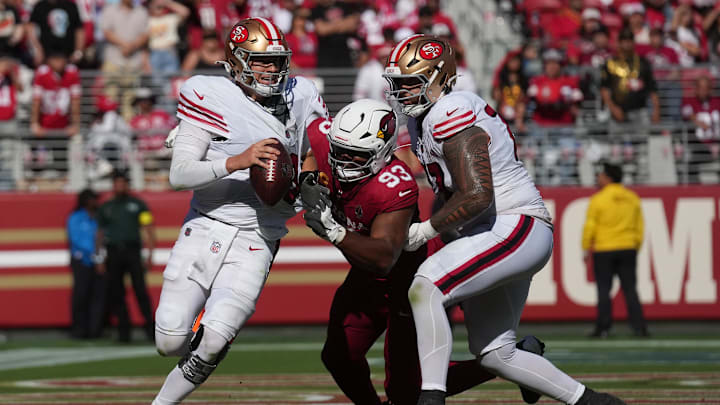 Sep 21, 2025; Santa Clara, California, USA; San Francisco 49ers quarterback Mac Jones (10) is sacked by Arizona Cardinals defensive end Calais Campbell (93) for a safety during the second half at Levi's Stadium. Mandatory Credit: Cary Edmondson-Imagn Images Sep 21, 2025; Santa Clara, California, USA; San Francisco 49ers quarterback Mac Jones (10) is sacked by Arizona Cardinals defensive end Calais Campbell (93) for a safety during the second half at Levi's Stadium. Mandatory Credit: Cary Edmondson-Imagn Images