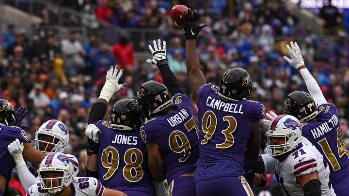 Oct 2, 2022; Baltimore, Maryland, USA; Buffalo Bills place kicker Tyler Bass (2) first half field clears Baltimore Ravens defensive tackle Calais Campbell (93) tented hand during at M&T Bank Stadium. Mandatory Credit: Tommy Gilligan-Imagn Images Oct 2, 2022; Baltimore, Maryland, USA; Buffalo Bills place kicker Tyler Bass (2) first half field clears Baltimore Ravens defensive tackle Calais Campbell (93) tented hand during at M&T Bank Stadium. Mandatory Credit: Tommy Gilligan-Imagn Images