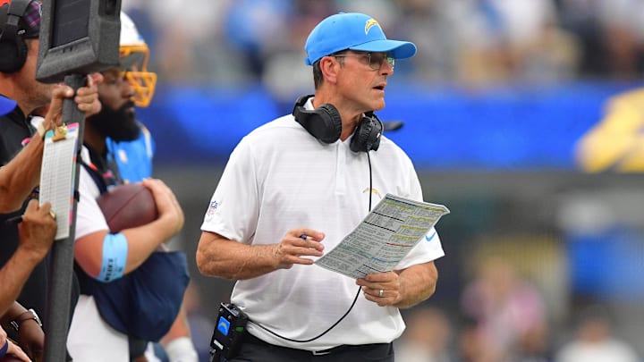 Oct 27, 2024; Inglewood, California, USA; Los Angeles Chargers head coach Jim Harbaugh watches game action against the New Orleans Saints during the second half at SoFi Stadium. Mandatory Credit: Gary A. Vasquez-Imagn Images