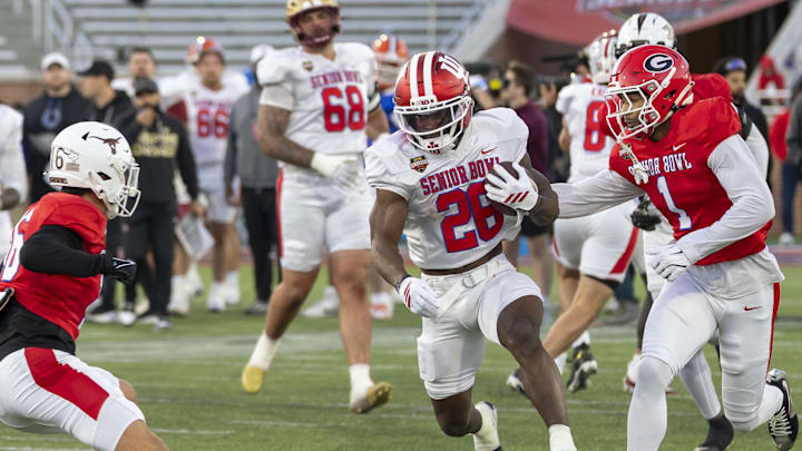 Jan 28, 2026; Mobile, AL, USA; American Team running back Kaelon Black (26) of Indiana runs the ball during American Senior Bowl practice at Hancock Whitney Stadium. Mandatory Credit: Vasha Hunt-Imagn Images