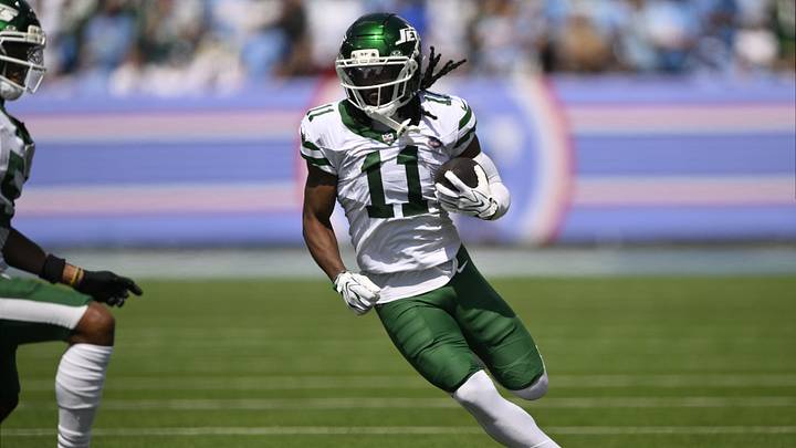 Sep 13, 2026; Nashville, Tennessee, USA; New York Jets wide receiver Omar Cooper Jr. (11) runs with the ball against the Tennessee Titans during the first quarter at Nissan Stadium. Mandatory Credit: Steve Roberts-Imagn Images Sep 13, 2026; Nashville, Tennessee, USA; New York Jets wide receiver Omar Cooper Jr. (11) runs with the ball against the Tennessee Titans during the first quarter at Nissan Stadium. Mandatory Credit: Steve Roberts-Imagn Images