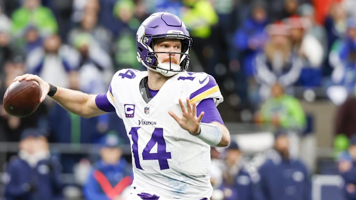 Dec 22, 2024; Seattle, Washington, USA; Minnesota Vikings quarterback Sam Darnold (14) passes against the Seattle Seahawks during the third quarter at Lumen Field. Dec 22, 2024; Seattle, Washington, USA; Minnesota Vikings quarterback Sam Darnold (14) passes against the Seattle Seahawks during the third quarter at Lumen Field.