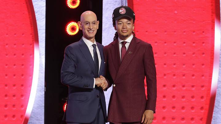 NBA commissioner Adam Silver greets the eighth pick in the 2026 NBA draft, Houston guard Kingston Flemings after he was selected by the Atlanta Hawks at Barclays Center. 