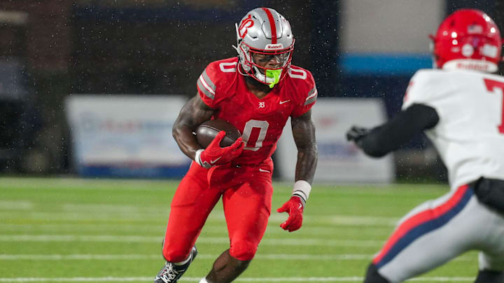 Baylor's David Gabriel Georges (0) carries the ball during the Division II-AAA championship game at Finley Stadium in Chattanooga, Tenn., on Dec. 4, 2025.