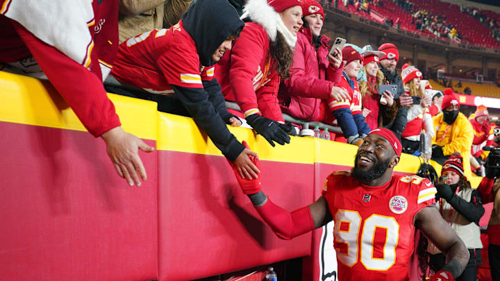 Jan 18, 2025; Kansas City, Missouri, USA; Kansas City Chiefs defensive end Charles Omenihu (90) greets fans while leaving the field after a 2025 AFC divisional round game against the Houston Texans at GEHA Field at Arrowhead Stadium. Mandatory Credit: Denny Medley-Imagn Images