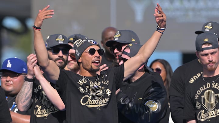 Nov 3, 2025; Los Angeles, CA, USA; Los Angeles Dodgers shortstop Mookie Betts (50) leads the crowd during the World Series celebration at Dodger Stadium. Mandatory Credit: Jayne Kamin-Oncea-Imagn Images