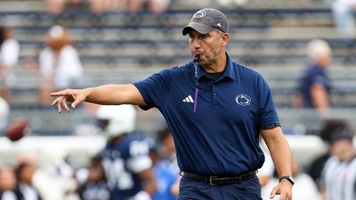 Penn State Nittany Lions coach Matt Campbell leads his team through warmups before the game vs. the Buffalo Bulls at Beaver Stadium. Penn State Nittany Lions coach Matt Campbell leads his team through warmups before the game vs. the Buffalo Bulls at Beaver Stadium.