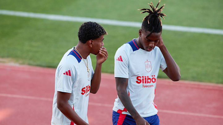 Lamine Yamal (L) of Spain speaks with Nicolas Williams (R)... Lamine Yamal (L) of Spain speaks with Nicolas Williams (R)...