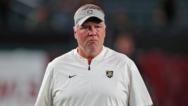 Sep 26, 2024; Philadelphia, Pennsylvania, USA; Army Black Knights defensive coordinator Nate Woody watches his players warm up before the first half against the Temple Owls at Lincoln Financial Field. Mandatory Credit: Danny Wild-Imagn Images