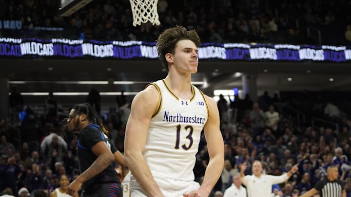 Dec 21, 2024; Evanston, Illinois, USA; Northwestern Wildcats guard Brooks Barnhizer (13) gestures after dunking the ball against the DePaul Blue Demons during the second half at Welsh-Ryan Arena. Mandatory Credit: David Banks-Imagn Images