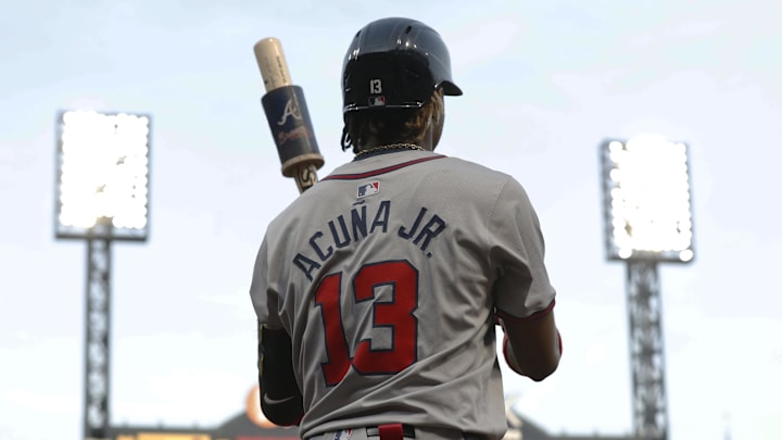 May 24, 2024; Pittsburgh, Pennsylvania, USA;  Atlanta Braves right fielder Ronald Acuna Jr. (13) in the on-deck circle against the Pittsburgh Pirates during the fifth inning  at PNC Park. Mandatory Credit: Charles LeClaire-Imagn Images