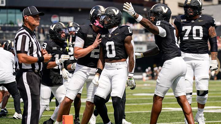 Vanderbilt wide receiver Junior Sherrill (0) celebrates his touchdown against NC State with quarterback Jared Curtis (2) during the second quarter at FirstBank Stadium in Nashville, Tenn., Saturday, Sept. 19, 2026.