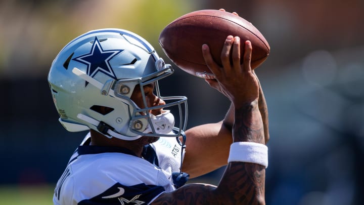 Wide receiver Dennis Houston makes a catch during Cowboys training camp.
