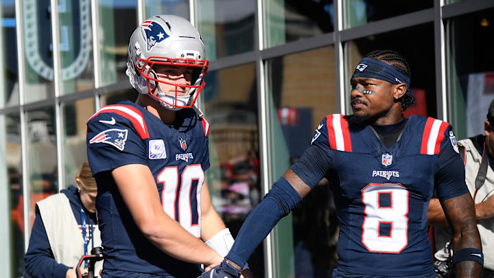Oct 26, 2025; Foxborough, Massachusetts, USA; New England Patriots quarterback Drake Maye (10) and wide receiver Stefon Diggs (8) get ready to take the field prior to a game against the Cleveland Browns at Gillette Stadium. Mandatory Credit: Bob DeChiara-Imagn Images