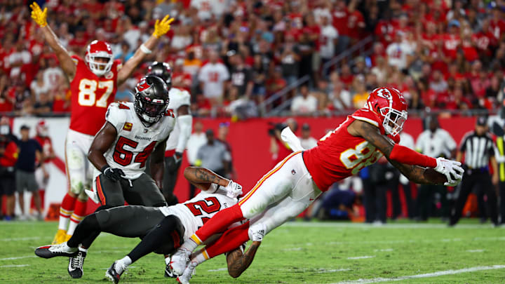 Oct 2, 2022; Tampa, Florida, USA;  Kansas City Chiefs tight end Jody Fortson (88) leaps into the end zone for a touchdown against the Tampa Bay Buccaneers in the third quarter at Raymond James Stadium. Mandatory Credit: Nathan Ray Seebeck-USA TODAY Sports
