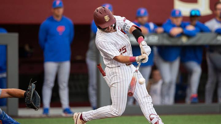 Florida State Seminoles catcher Hunter Carns (25) swings at a pitch. The Florida State Seminoles hosted the Florida Gators at Dick Howser Stadium on Tuesday, April 7, 2026.