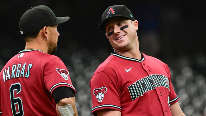 Apr 30, 2026; Milwaukee, Wisconsin, USA; Arizona Diamondbacks catcher James McCann (8) laughs with first baseman Ildemaro Vargas (6) while pitching in the eighth inning against the Milwaukee Brewers at American Family Field. Mandatory Credit: Benny Sieu-Imagn Images Apr 30, 2026; Milwaukee, Wisconsin, USA; Arizona Diamondbacks catcher James McCann (8) laughs with first baseman Ildemaro Vargas (6) while pitching in the eighth inning against the Milwaukee Brewers at American Family Field. Mandatory Credit: Benny Sieu-Imagn Images