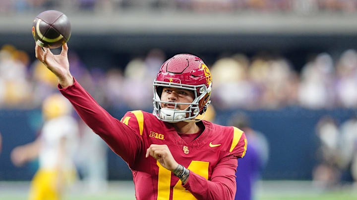 Sep 1, 2024; Paradise, Nevada, USA; Southern California Trojans quarterback Jayden Maiava (14) warms up before a game against the LSU Tigers at Allegiant Stadium. Mandatory Credit: Stephen R. Sylvanie-Imagn Images