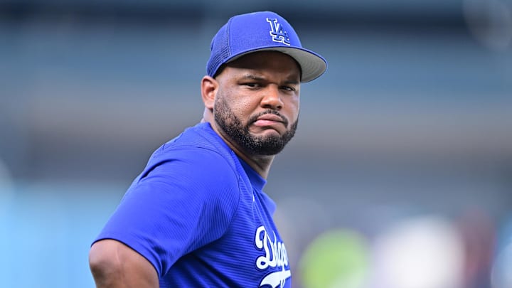 Sep 2, 2022; Los Angeles, California, USA;  Los Angeles Dodgers second baseman Hanser Alberto (17) warms up prior to the game against the San Diego Padres at Dodger Stadium. Mandatory Credit: Jayne Kamin-Oncea-Imagn Images