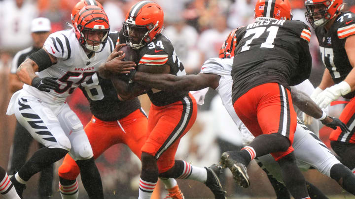 Cleveland Browns running back Jerome Ford (34) carries the ball as Cincinnati Bengals linebacker Logan Wilson (55) defends in the second quarter of an NFL football game between the Cincinnati Bengals and Cleveland Browns, Sunday, Sept. 10, 2023, at Cleveland Browns Stadium in Cleveland. Cleveland Browns running back Jerome Ford (34) carries the ball as Cincinnati Bengals linebacker Logan Wilson (55) defends in the second quarter of an NFL football game between the Cincinnati Bengals and Cleveland Browns, Sunday, Sept. 10, 2023, at Cleveland Browns Stadium in Cleveland.