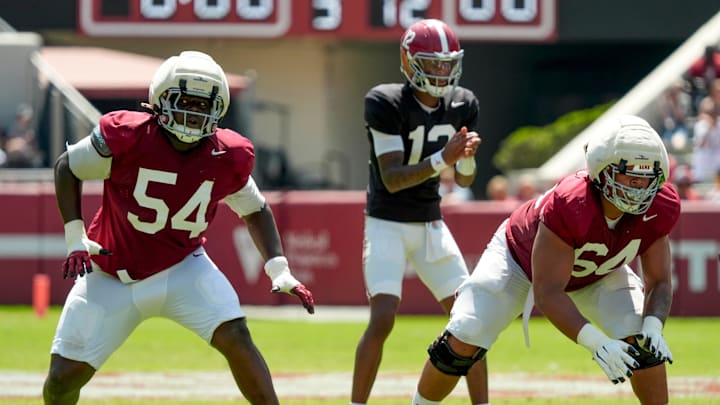 April 11, 2026; Tuscaloosa, AL, USA; Alabama offensive linemen Jayvin James and Michael Carroll drop to block at Bryant-Denny Stadium during the Alabama A Day scrimmage.