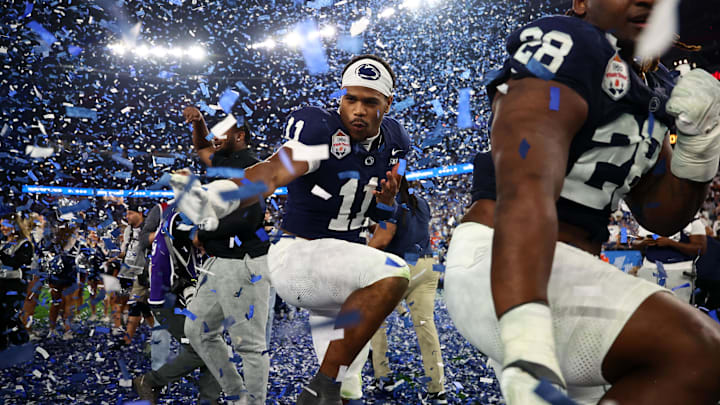 Penn State Nittany Lions defensive end Abdul Carter (11) reacts with teammates after defeating the Boise State Broncos in the Fiesta Bowl at State Farm Stadium. 