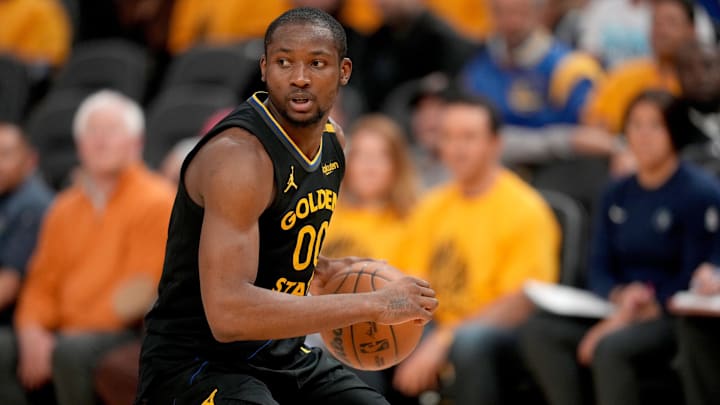 May 12, 2025; San Francisco, California, USA; Golden State Warriors forward Jonathan Kuminga (00) holds onto the ball against the Minnesota Timberwolves in the fourth quarter during game four of the second round for the 2025 NBA Playoffs at Chase Center. Mandatory Credit: Cary Edmondson-Imagn Images May 12, 2025; San Francisco, California, USA; Golden State Warriors forward Jonathan Kuminga (00) holds onto the ball against the Minnesota Timberwolves in the fourth quarter during game four of the second round for the 2025 NBA Playoffs at Chase Center. Mandatory Credit: Cary Edmondson-Imagn Images