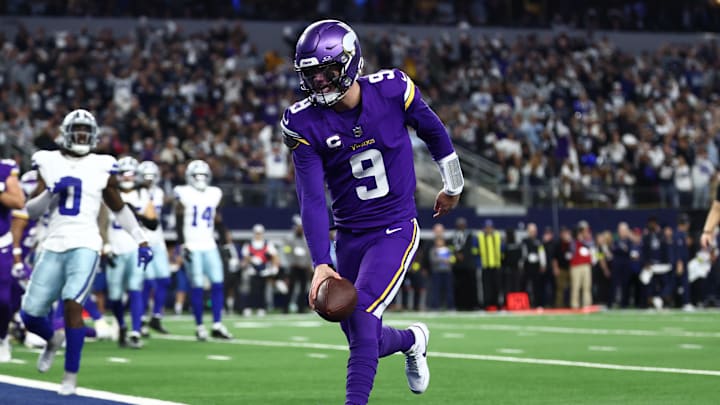 Dec 14, 2025; Arlington, Texas, USA; Minnesota Vikings quarterback J.J. McCarthy (9) runs for a touchdown during the first half against the Dallas Cowboys at AT&T Stadium.