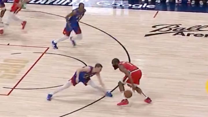 Harden dribbling against Braun. 