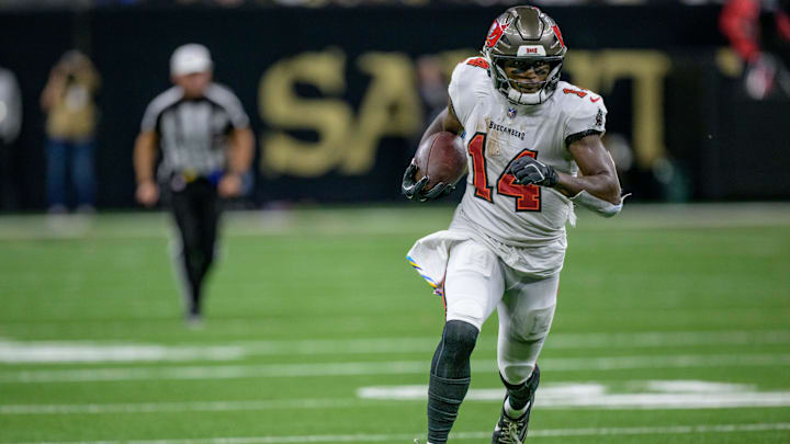 Oct 13, 2024; New Orleans, Louisiana, USA; Tampa Bay Buccaneers wide receiver Chris Godwin (14) runs in for a touchdown during the third quarter against the New Orleans Saints at Caesars Superdome. Mandatory Credit: Matthew Hinton-Imagn Images Oct 13, 2024; New Orleans, Louisiana, USA; Tampa Bay Buccaneers wide receiver Chris Godwin (14) runs in for a touchdown during the third quarter against the New Orleans Saints at Caesars Superdome. Mandatory Credit: Matthew Hinton-Imagn Images
