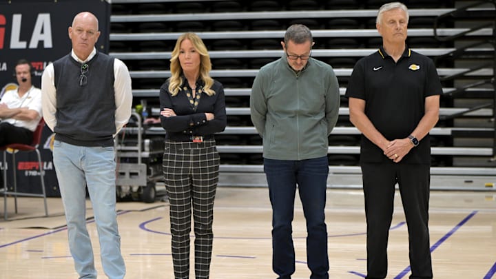 Jun 24, 2024; El Segundo, CA, USA - Jeannie Buss, controlling owner and president of the Los Angeles Lakers, stands with front office executives, as they listen during the introductory news conference for new head coach JJ Redick at the UCLA Health Training Center. Mandatory Credit: Jayne Kamin-Oncea-Imagn Images