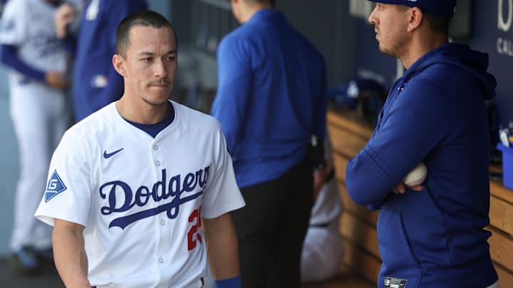 Apr 13, 2025; Los Angeles, California, USA; Los Angeles Dodgers outfielder Tommy Edman (25) looks on before the game against the Chicago Cubs at Dodger Stadium. Mandatory Credit: Kiyoshi Mio-Imagn Images