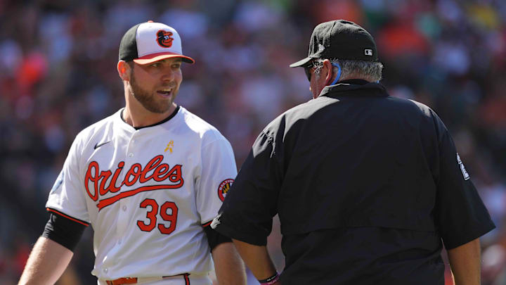 Sep 2, 2024; Baltimore, Maryland, USA; Baltimore Orioles pitcher Corbin Burnes (39) talks with umpire Hunter Wendelstedt after the second inning against the Chicago White Sox at Oriole Park at Camden Yards. Sep 2, 2024; Baltimore, Maryland, USA; Baltimore Orioles pitcher Corbin Burnes (39) talks with umpire Hunter Wendelstedt after the second inning against the Chicago White Sox at Oriole Park at Camden Yards.