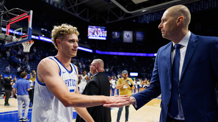 Nov 9, 2024; Lexington, Kentucky, USA; Kentucky Wildcats head coach Mark Pope fives guard Collin Chandler (5) after the game against the Bucknell Bison at Rupp Arena at Central Bank Center. Mandatory Credit: Jordan Prather-Imagn Images