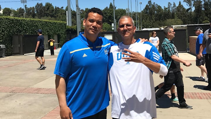 Scott White, former UW linebacker, was a UCLA associate head coach and LB coach.