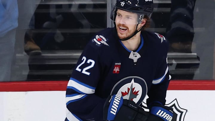 Mar 30, 2025; Winnipeg, Manitoba, CAN; Winnipeg Jets center Mason Appleton (22) celebrates his goal against the Vancouver Canucks in the third period at Canada Life Centre. Mandatory Credit: James Carey Lauder-Imagn Images