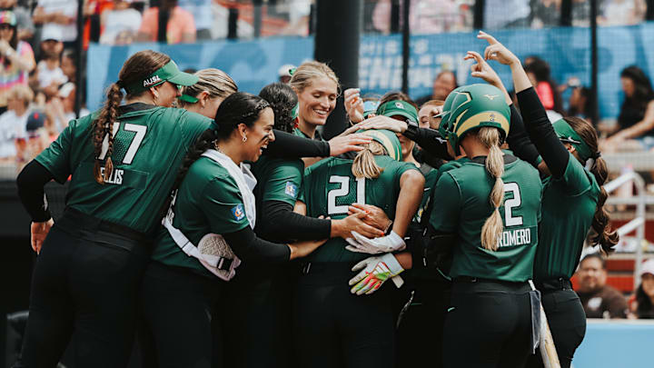 AUSL Talons celebrate after a home run from Sierra Sacco (21).