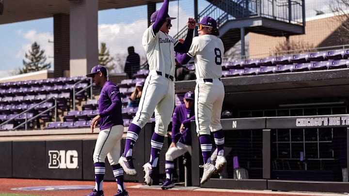 Northwestern Wildcats baseball players celebrate during a game against Western Michigan on March 25, 2025.