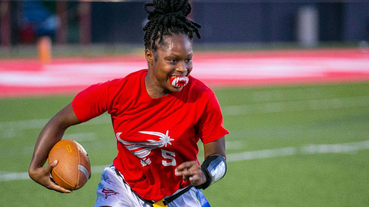 Bradford Nichelle Brown (5) dives for yards during an FHSAA flag football game against Middleburg at Bradford High School in Stark, FL on Wednesday, April 17, 2024. [Alan Youngblood/Gainesville Sun]