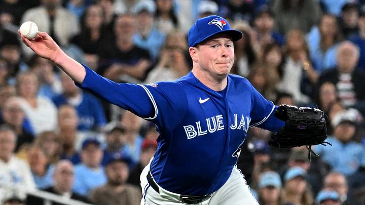 Apr 7, 2026; Toronto, Ontario, CAN; Toronto Blue Jays relief pitcher Louis Varland (77) throws to first base to force out Los Angeles Dodgers first baseman Freddie Freeman (not shown) in the eighth inning at Rogers Centre. Apr 7, 2026; Toronto, Ontario, CAN; Toronto Blue Jays relief pitcher Louis Varland (77) throws to first base to force out Los Angeles Dodgers first baseman Freddie Freeman (not shown) in the eighth inning at Rogers Centre.