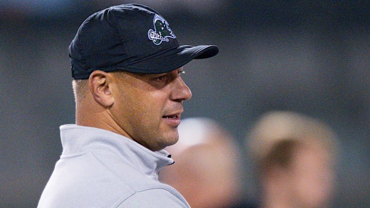 Nov 28, 2024; New Orleans, Louisiana, USA; Tulane Green Wave head coach Jon Sumrall, left, talks with Memphis Tigers head coach Ryan Silverfield before the start of the game at Yulman Stadium