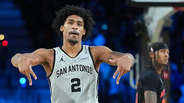 Dec 16, 2025; Las Vegas, Nevada, USA; San Antonio Spurs guard Dylan Harper (2) reacts against the New York Knicks in the second half during the Emirates NBA Cup Final at T-Mobile Arena.