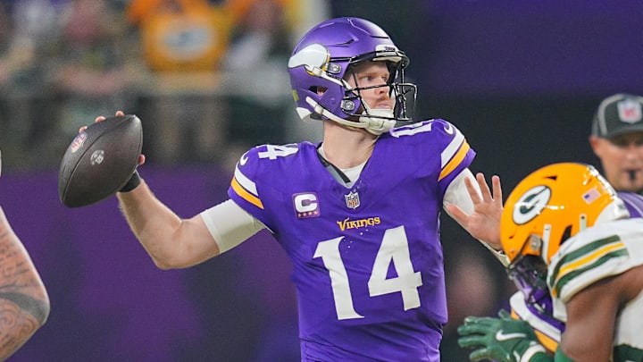 Dec 29, 2024; Minneapolis, Minnesota, USA; Minnesota Vikings quarterback Sam Darnold (14) passes against Green Bay Packers in the second quarter at U.S. Bank Stadium. Mandatory Credit: Brad Rempel-Imagn Images