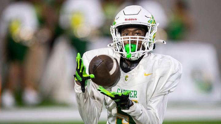 Carver's Mekhi Williams (5) catches a long pass for a touchdown at Cramton Bowl in Montgomery, Ala. on Friday, Aug. 29, 2025. Carver leads Percy Julian 32-6 at halftime.