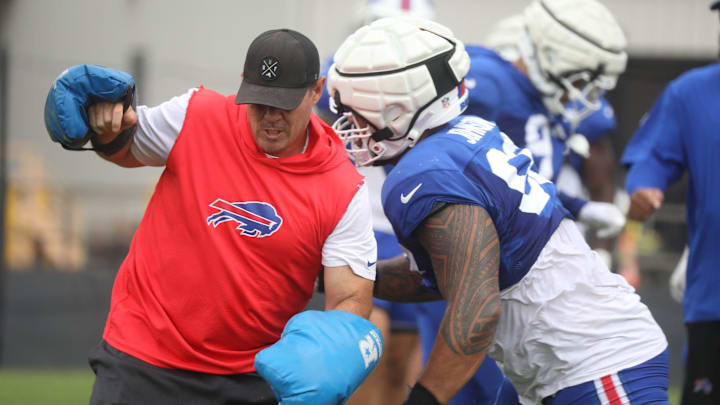 Assistant Defensive Line Coach Matt Edwards runs a drill with pads with the players during Bills training camp at St. John Fisher University in Pittsford, NY on Aug. 5, 2024.