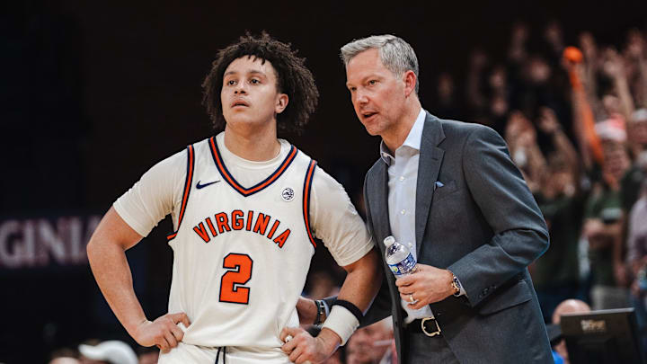 Virginia Cavaliers guard Chance Mallory and head coach Ryan Odom 