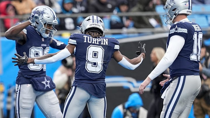 Dallas Cowboys wide receiver Jalen Brooks celebrates his touchdown catch with wide receiver KaVontae Turpin during the second half against the Carolina Panthers.