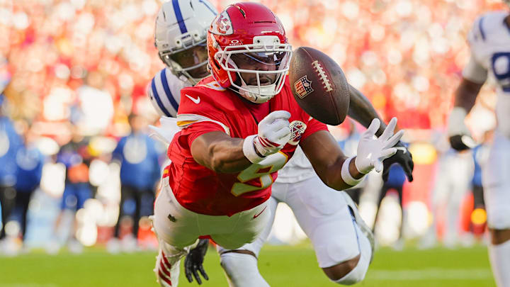 Kansas City Chiefs wide receiver JuJu Smith-Schuster (9) is unable to make the catch against Indianapolis Colts cornerback Charvarius Ward (7) during the second half at GEHA Field at Arrowhead Stadium.